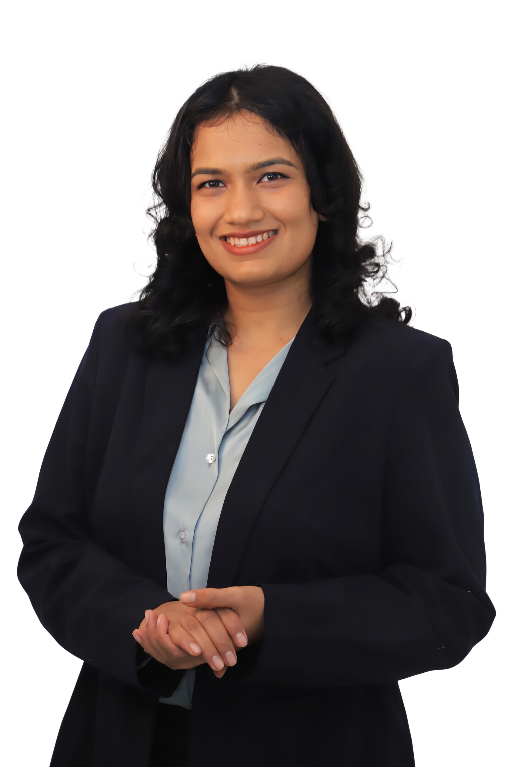 Ishita Moya smiling in a professional portrait